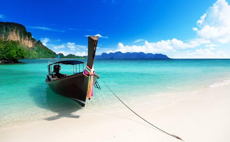 Longtail Boat on Beach — Blue, Serene, Afternoon, Photograph, Sea