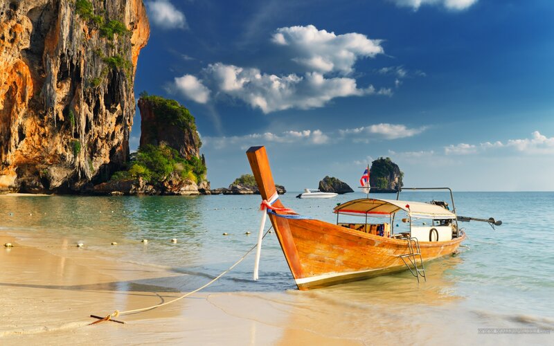 Longtail Boat on Beach — Blue, Serene