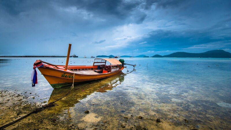 Longtail Boat on Shore