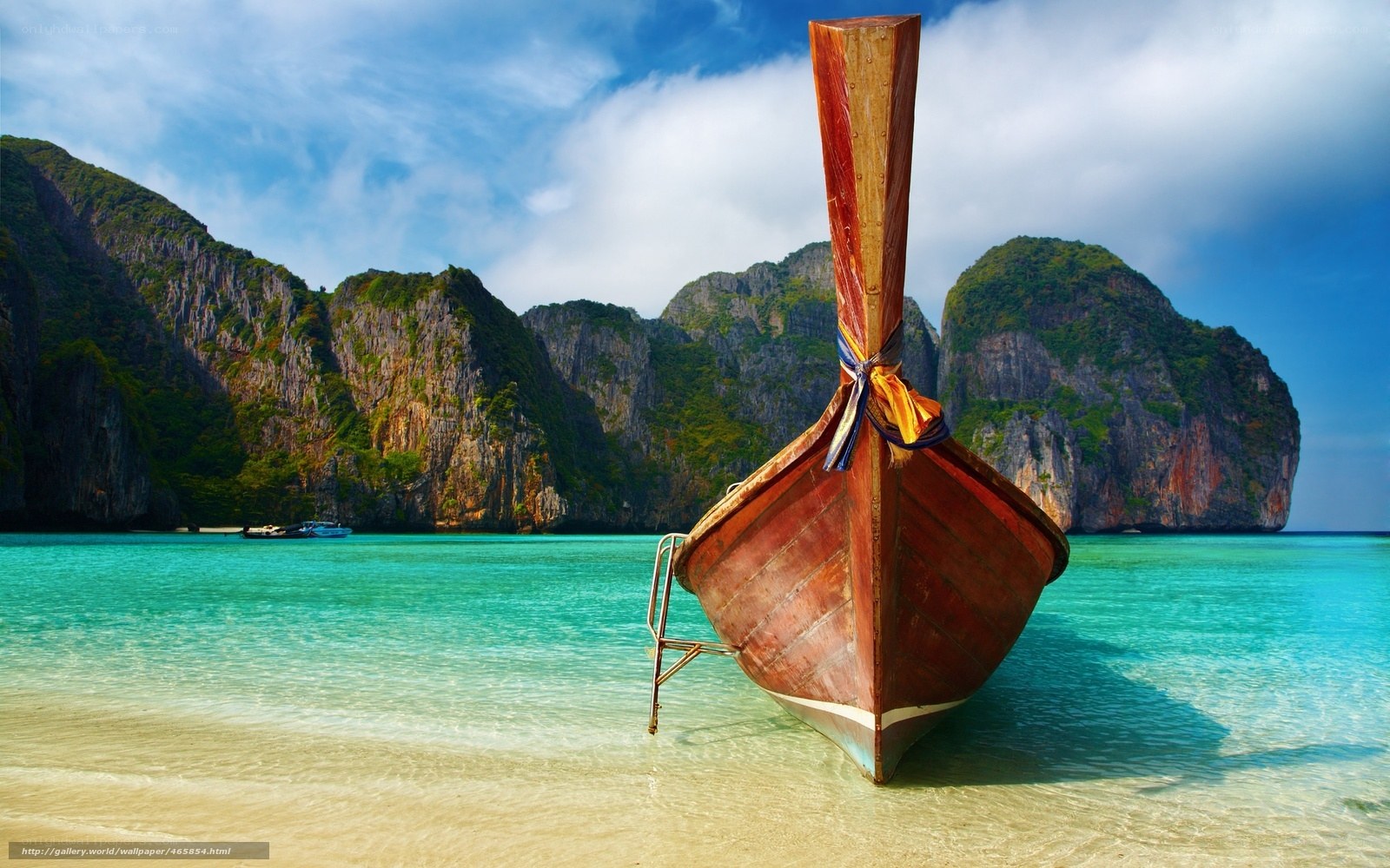 Longtail boat on tropical beach