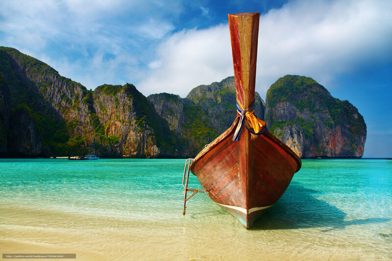 Longtail boat on tropical beach