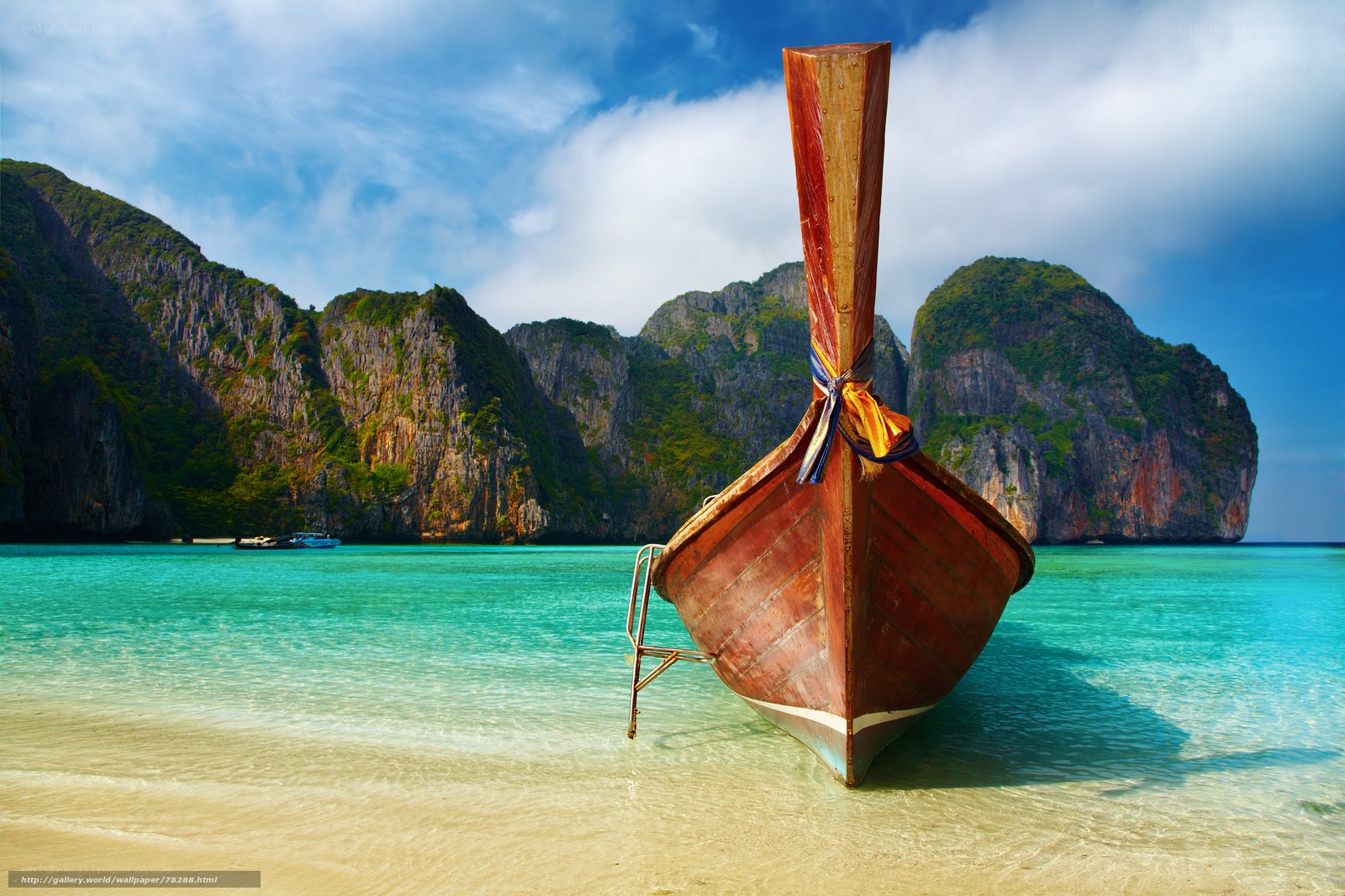 Longtail boat on tropical beach