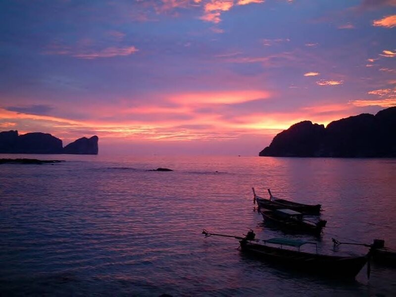 Longtail Boats at Sunset