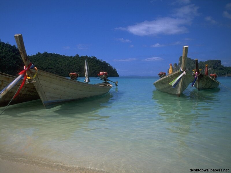 Longtail boats at tropical beach