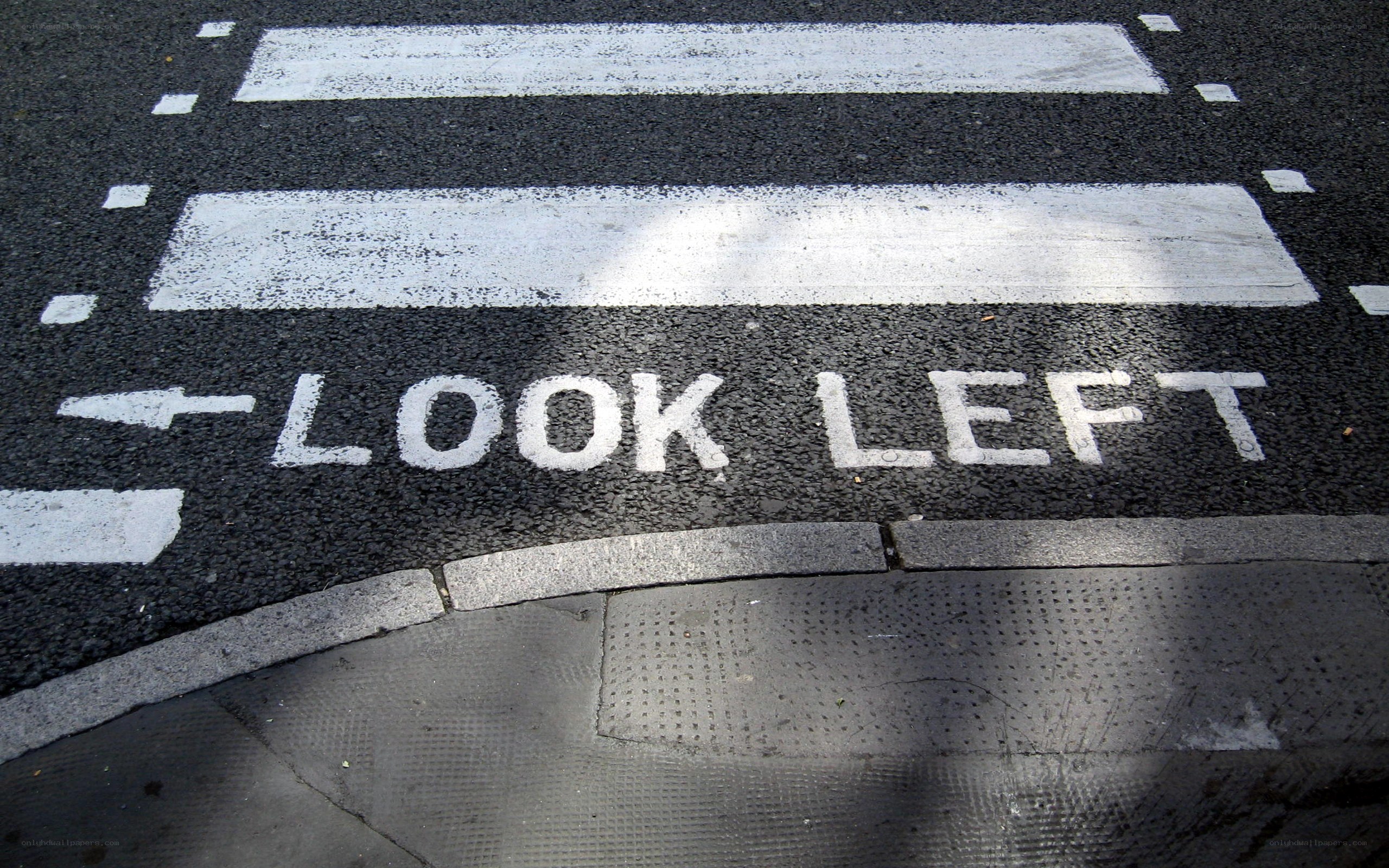 Look Left road marking