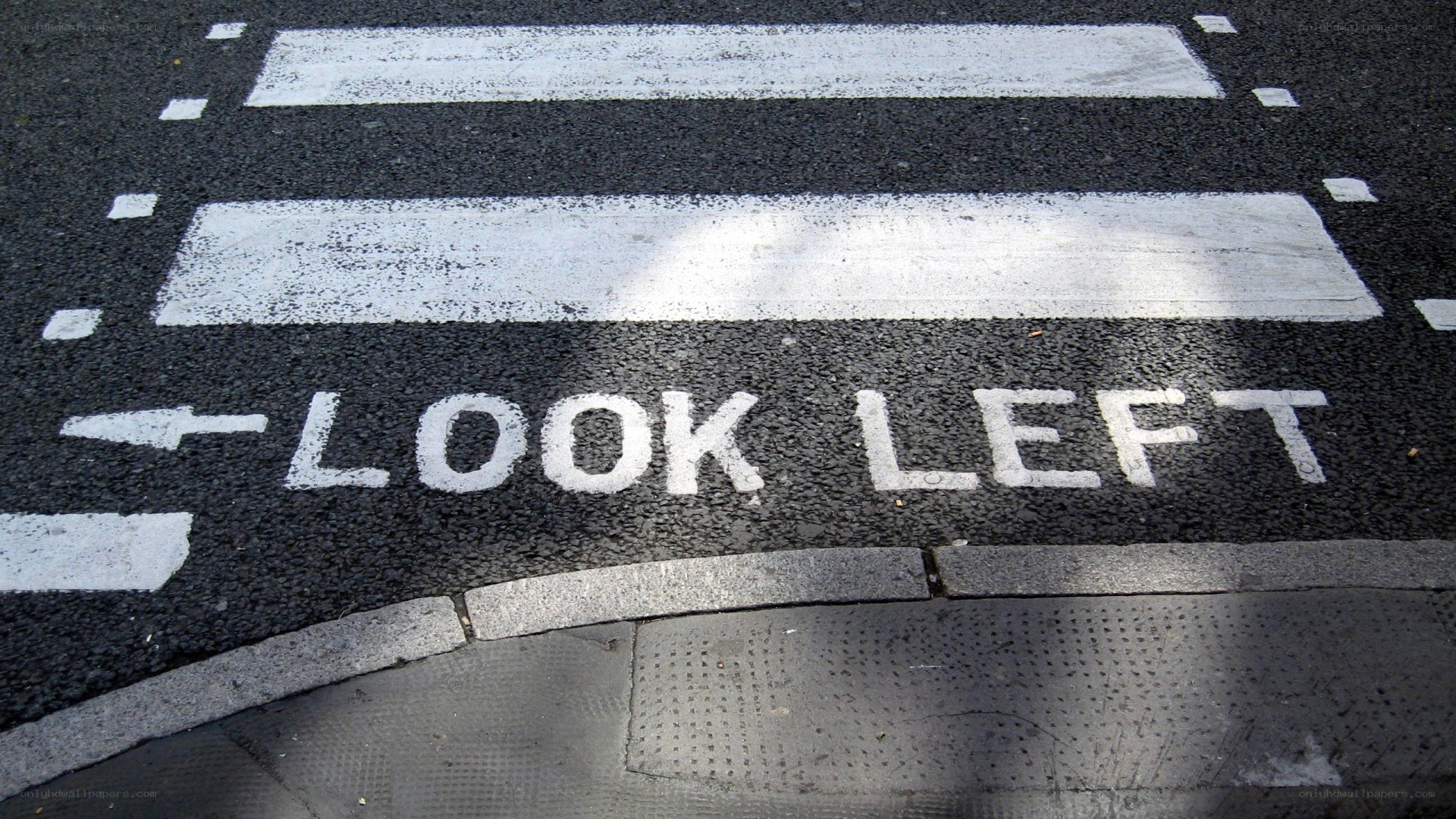 Look Left road marking