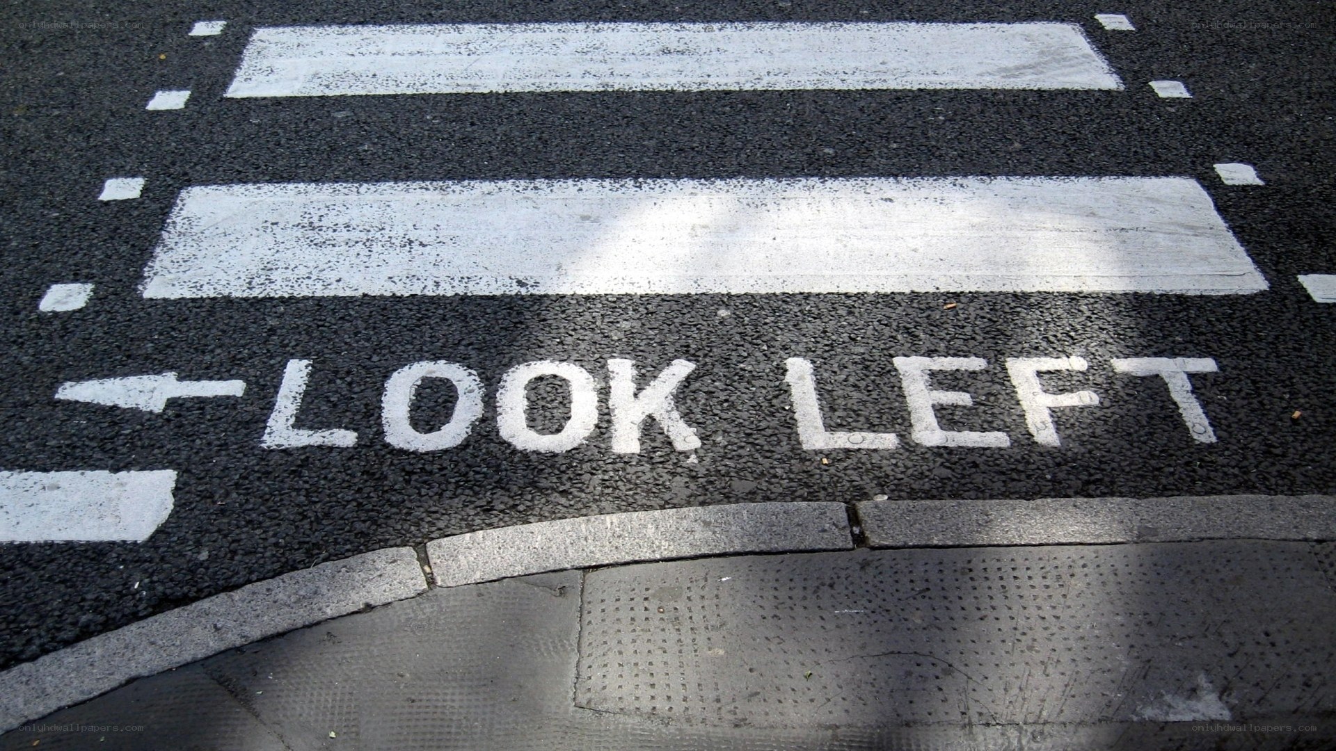 Look Left road marking