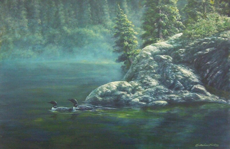 Loons on a misty lake
