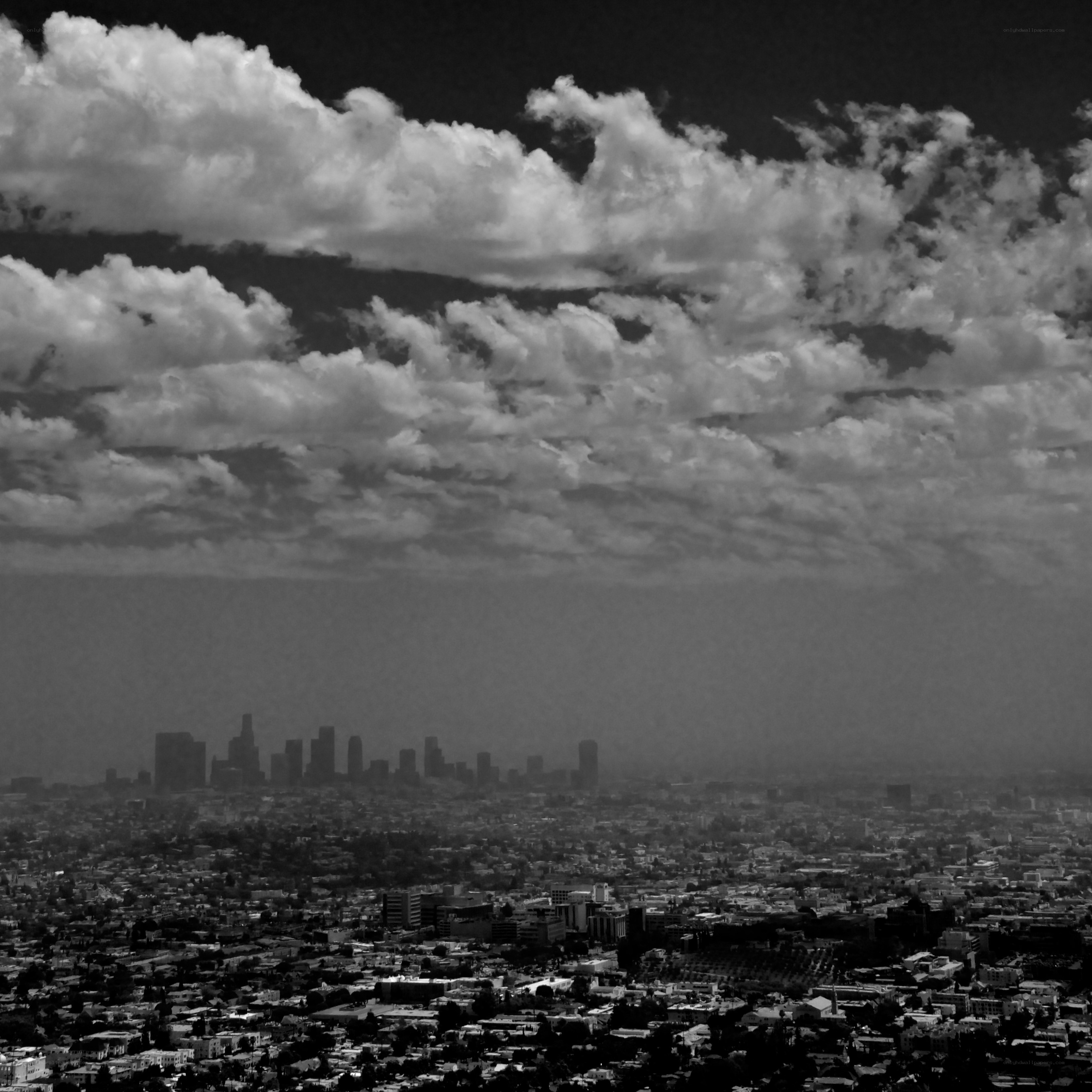 Los Angeles skyline under cloudy sky
