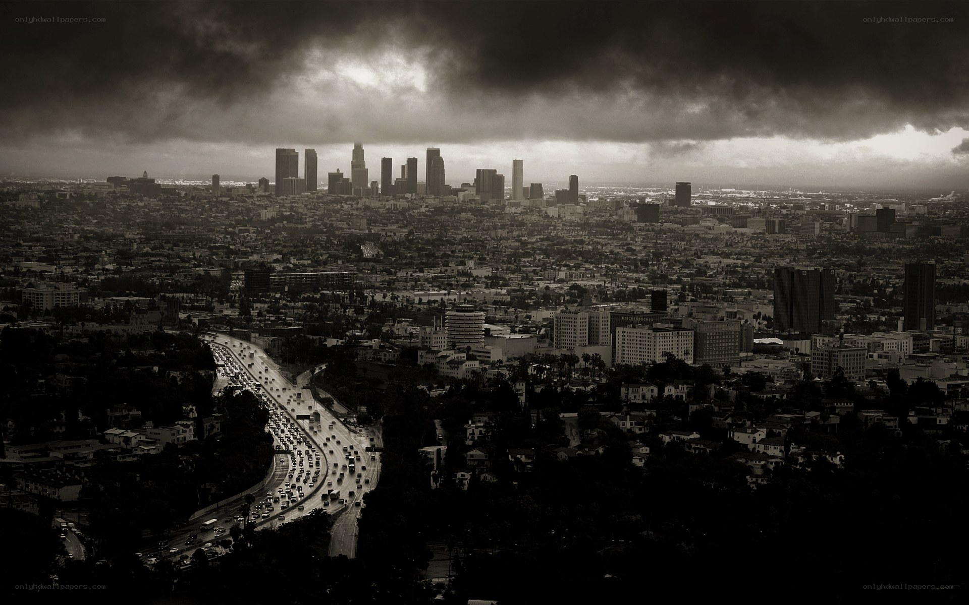 Los Angeles skyline under storm clouds