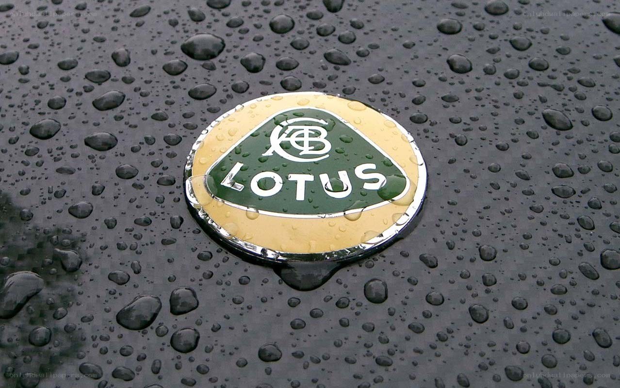 Lotus car emblem on wet surface