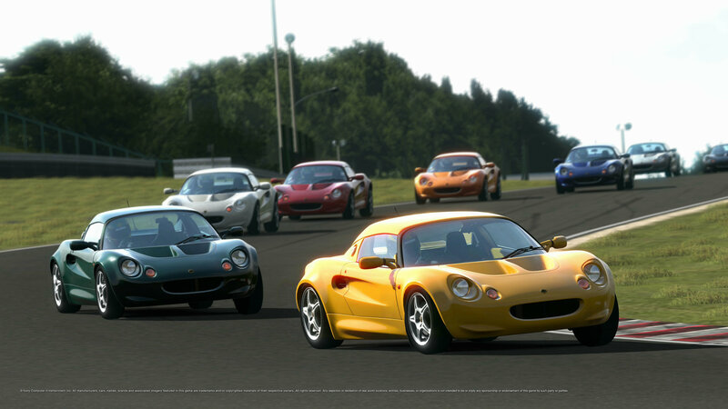 Lotus cars racing on a track