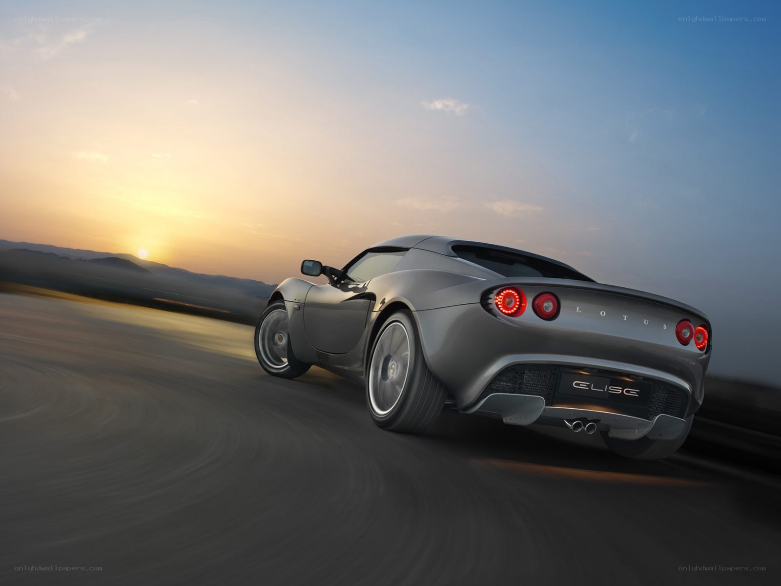 Lotus Elise in motion at sunset