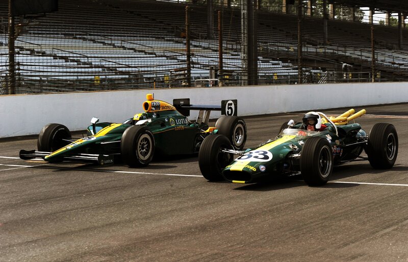 Lotus race cars on track