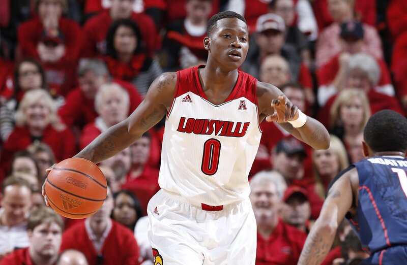 Louisville basketball player dribbling