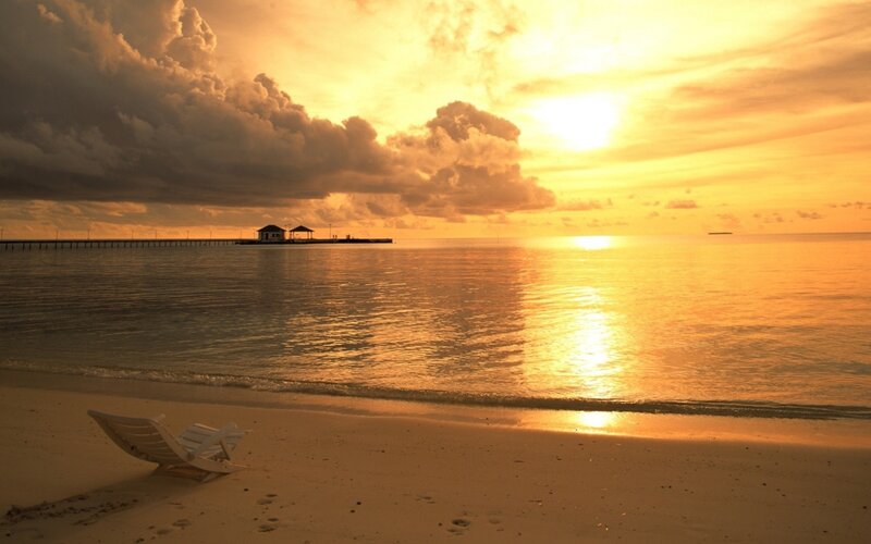 Lounge Chair on Beach — Orange, Serene, Sunset, Photograph, Ocean