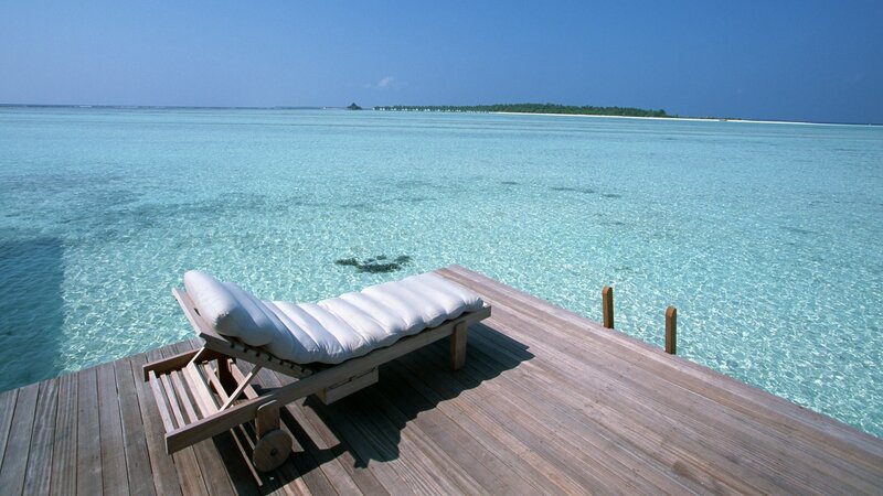 Lounge chair on wooden deck