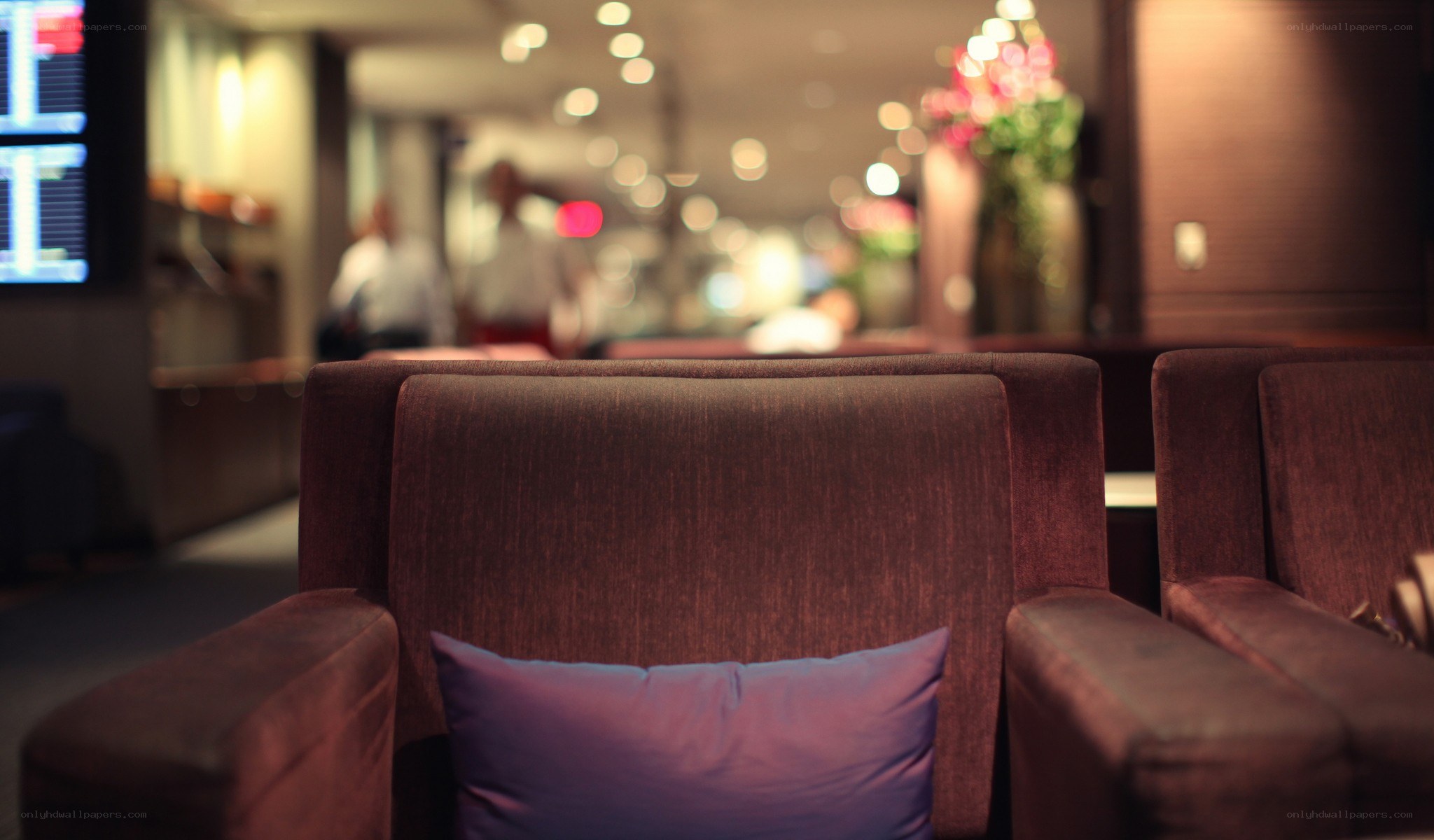 Lounge seating with purple pillow