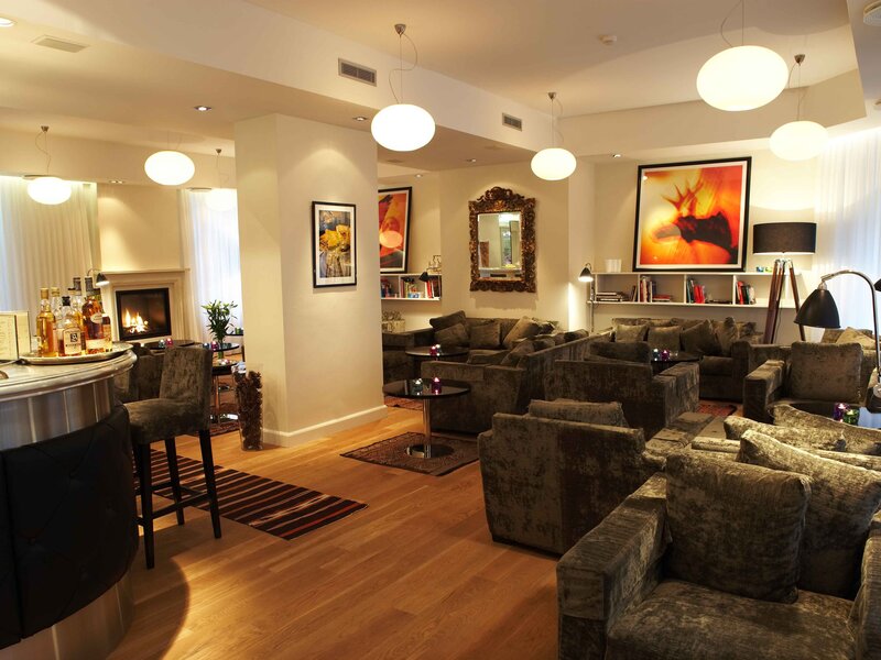 Lounge with fireplace and seating