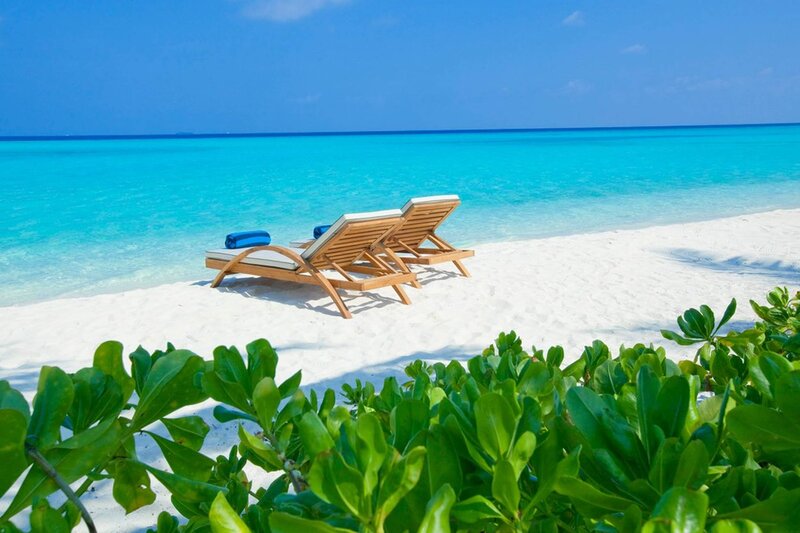 Loungers on Tropical Beach