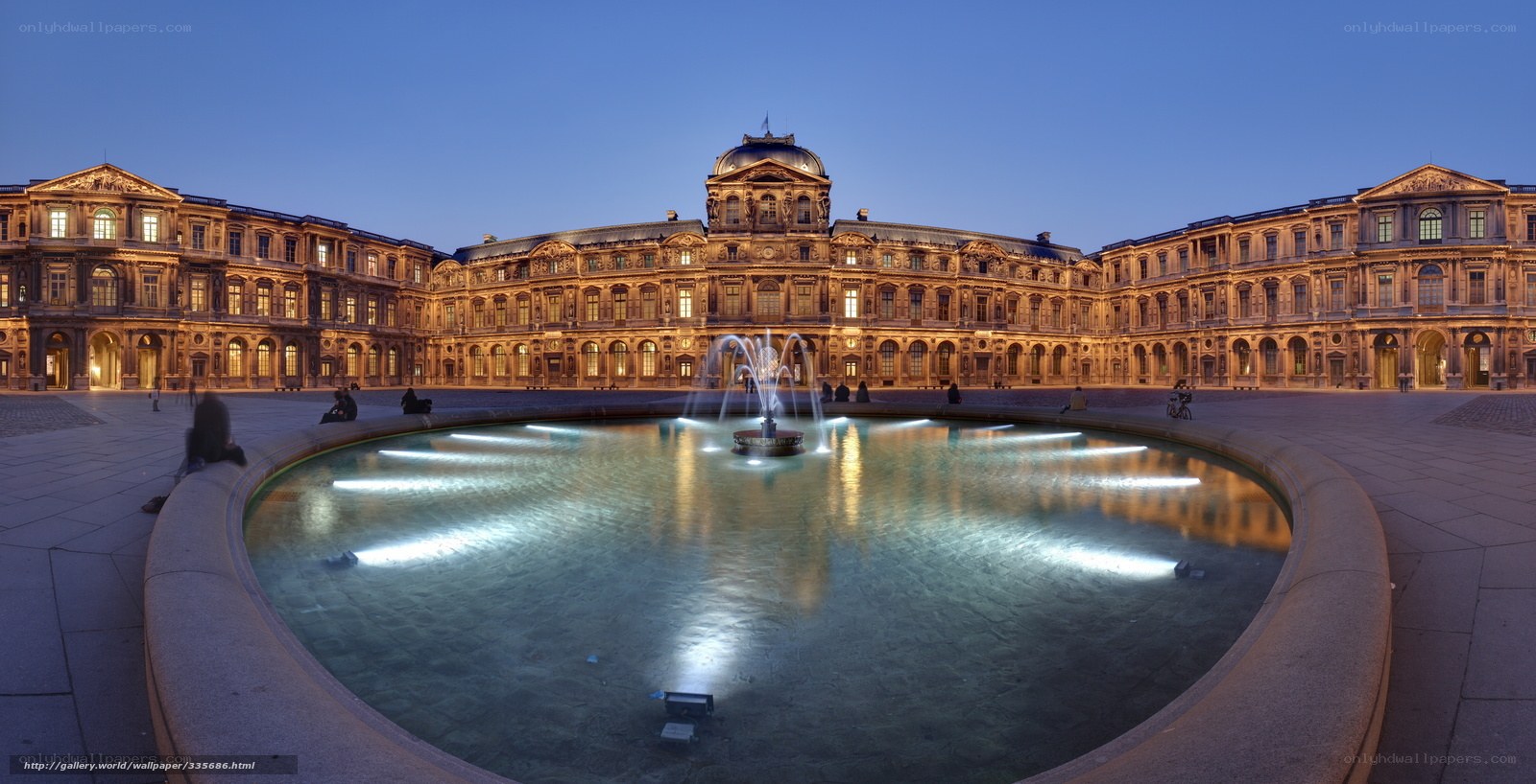 Louvre courtyard at dusk