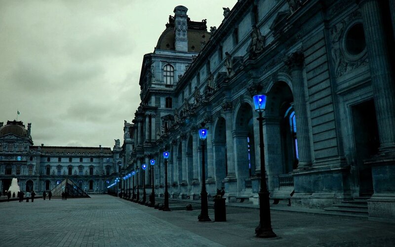Louvre courtyard at dusk