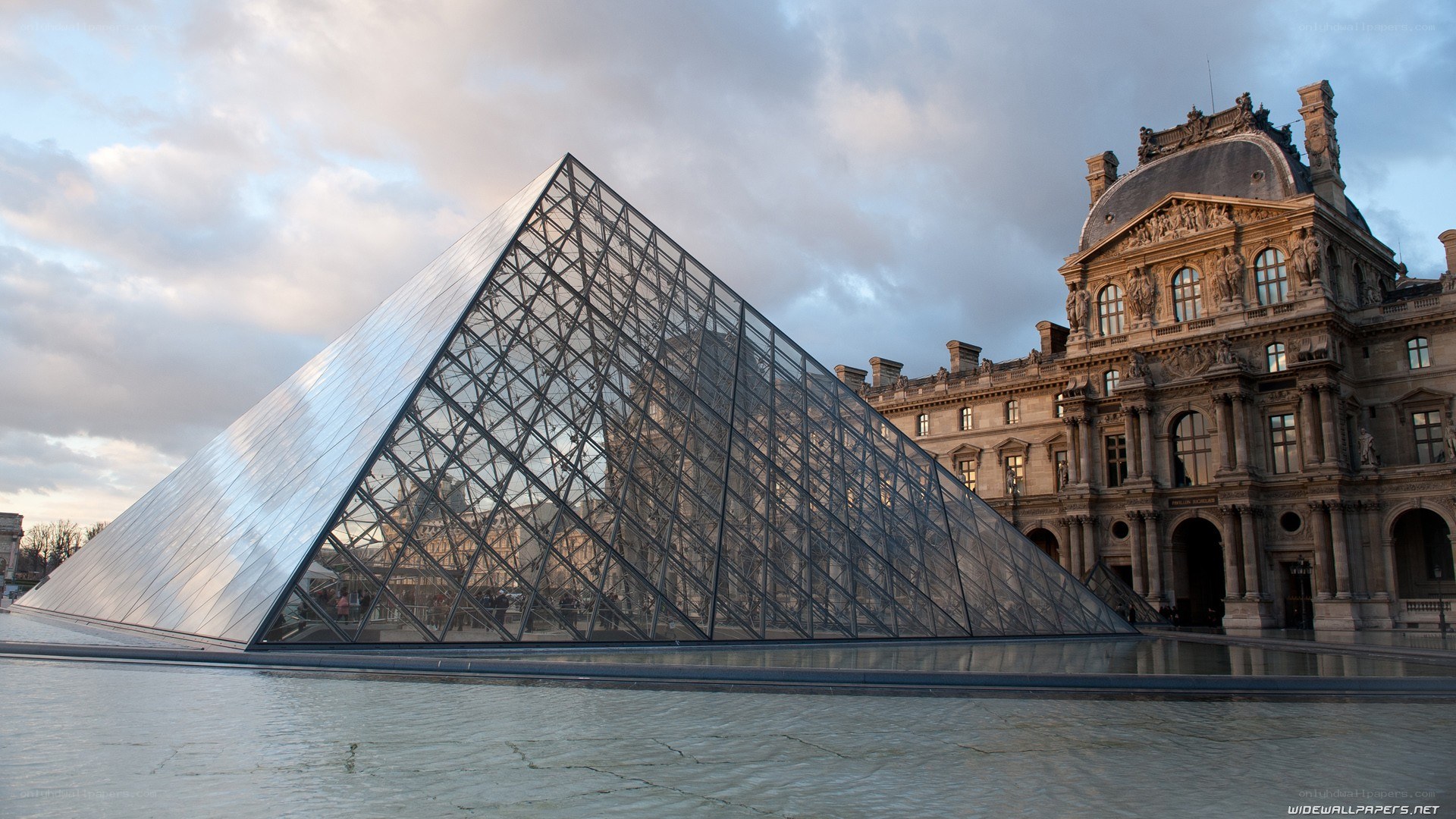 Louvre Pyramid at dusk