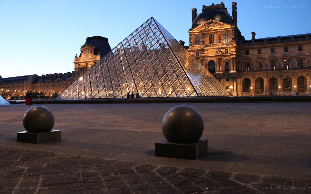 Louvre Pyramid at dusk