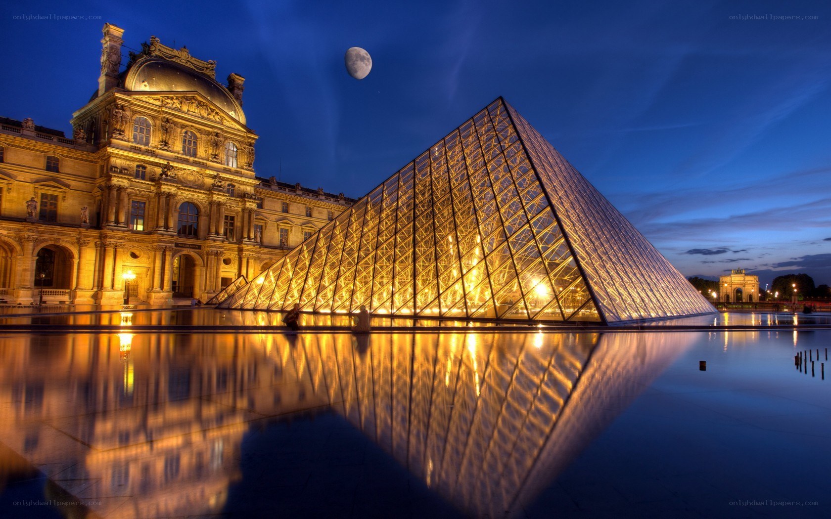 Louvre Pyramid at dusk