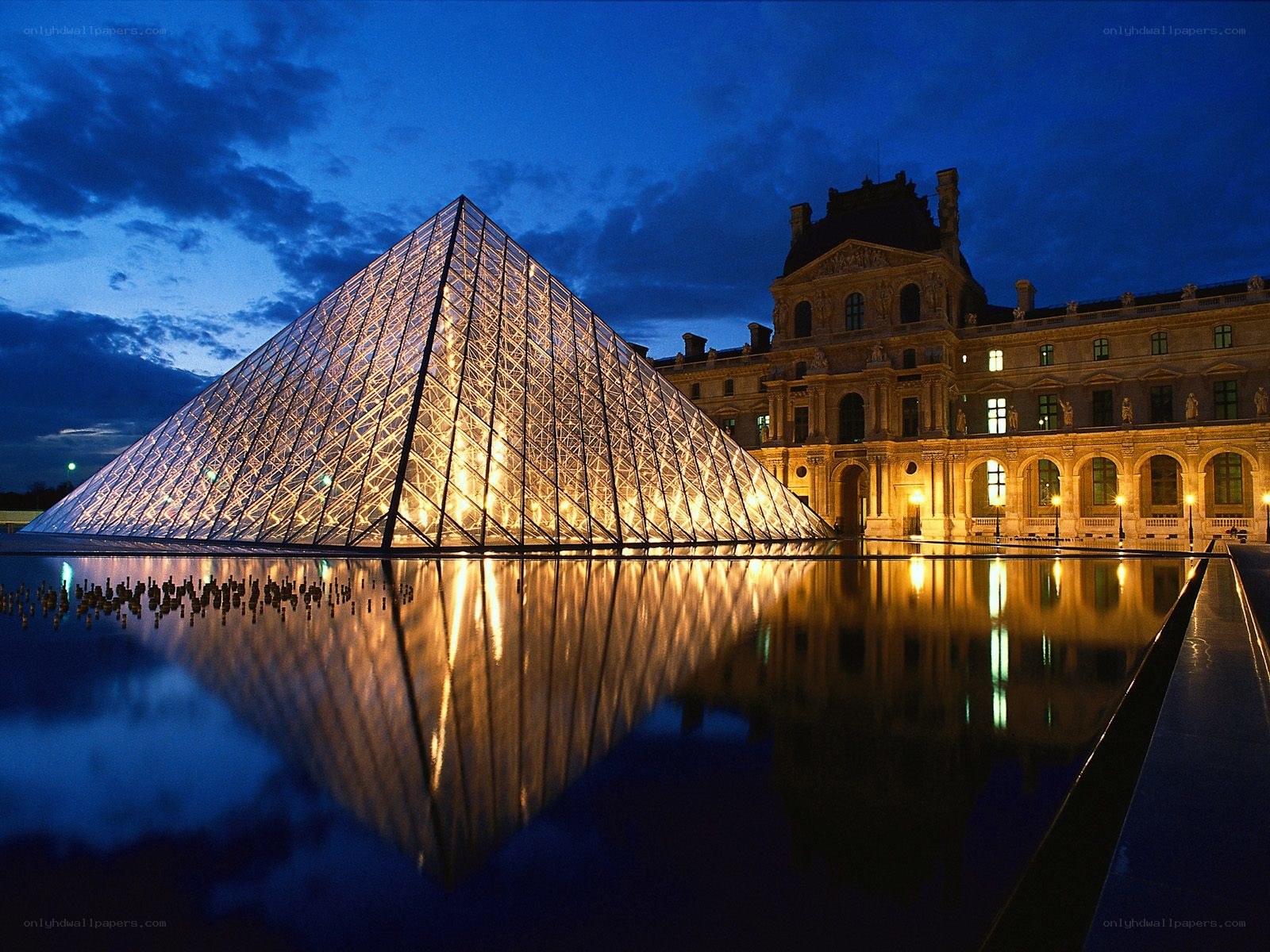 Louvre Pyramid at dusk