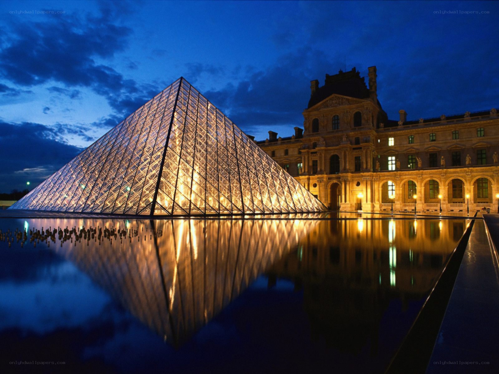 Louvre Pyramid at dusk
