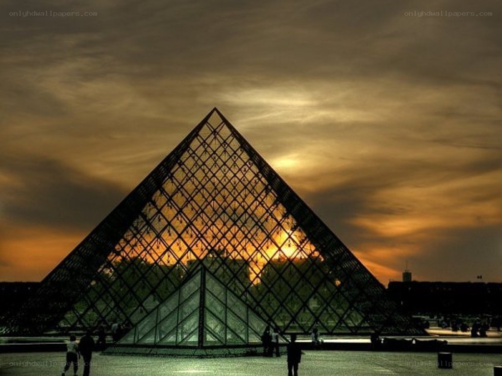 Louvre Pyramid at sunset