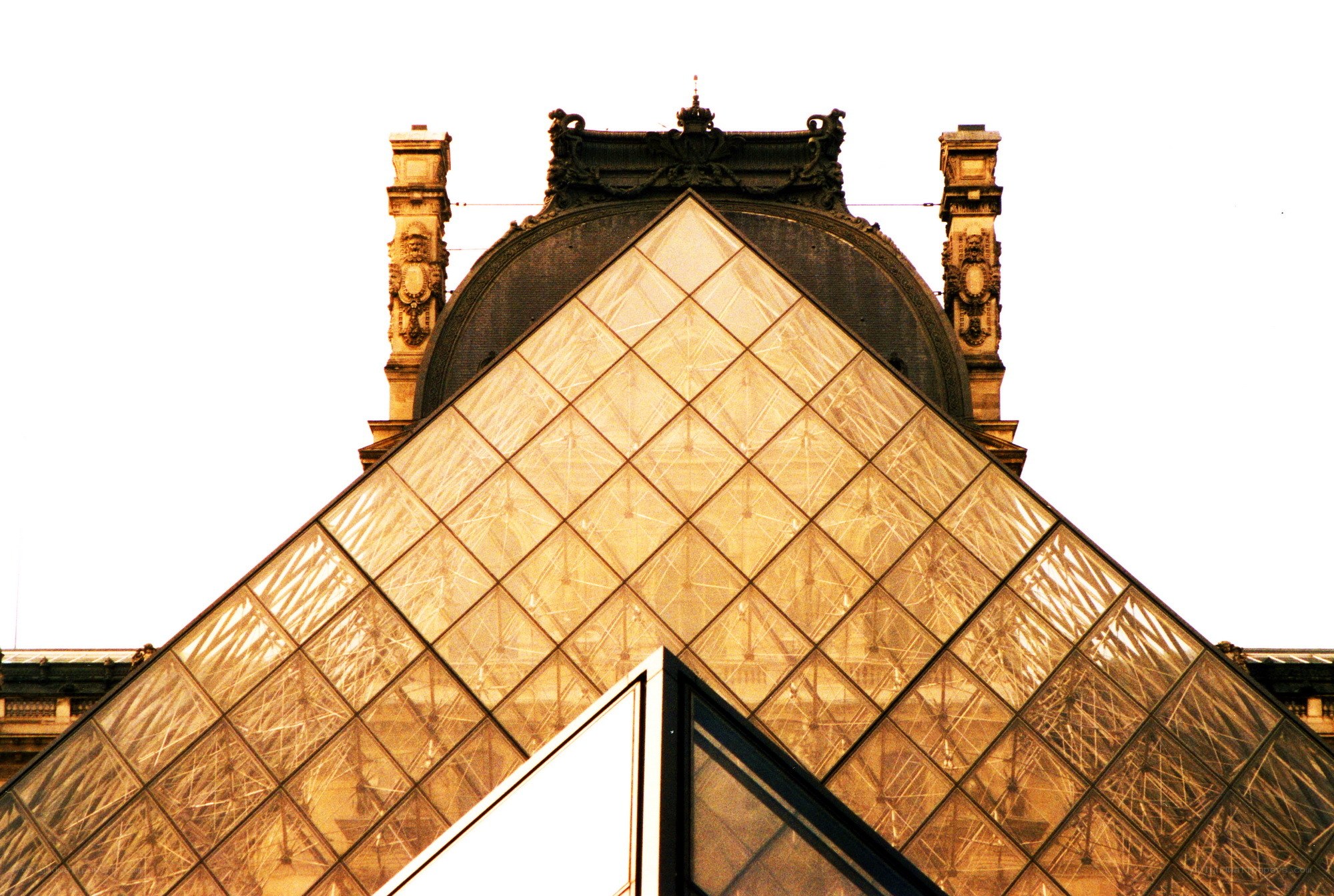 Louvre Pyramid at sunset