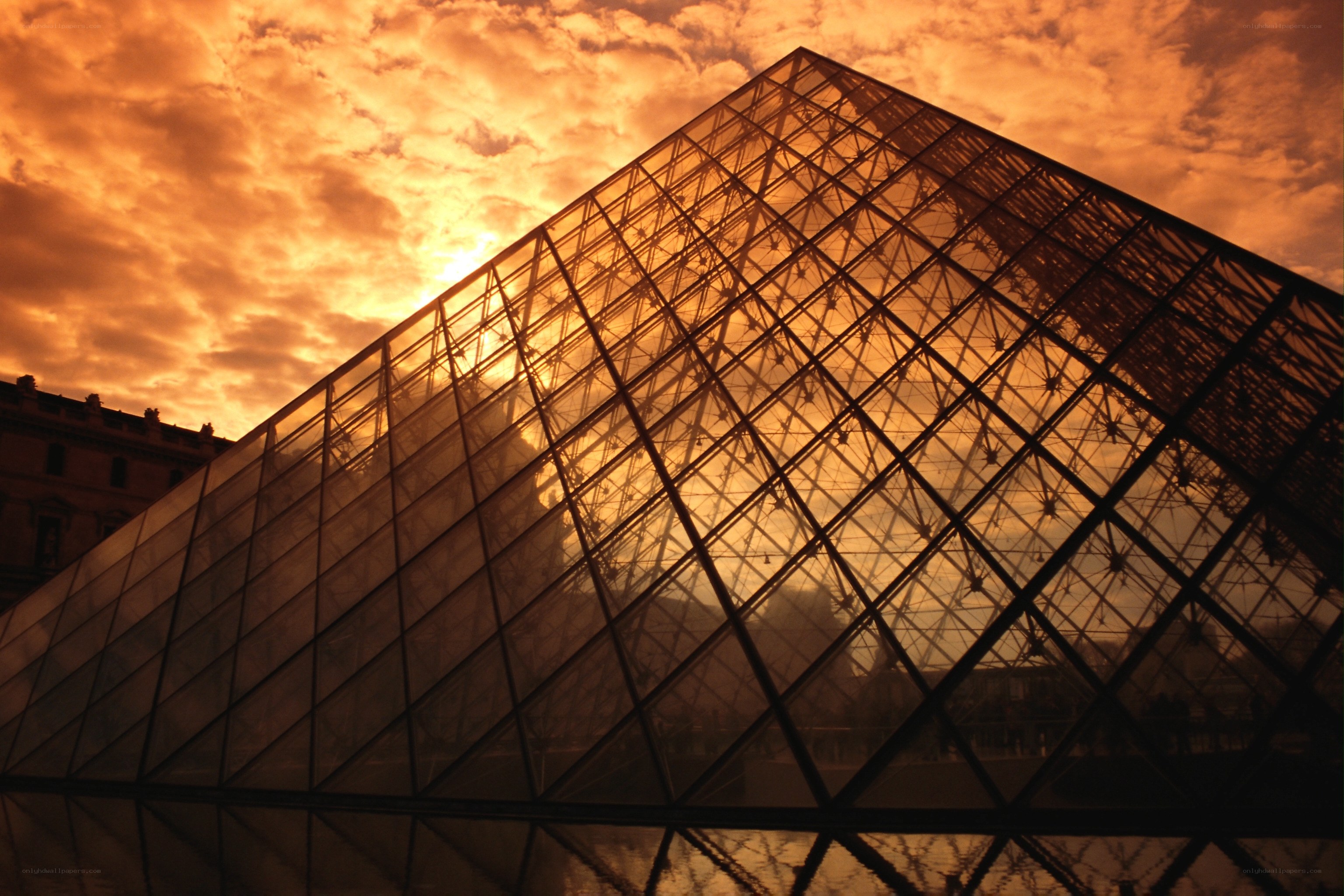Louvre Pyramid at sunset