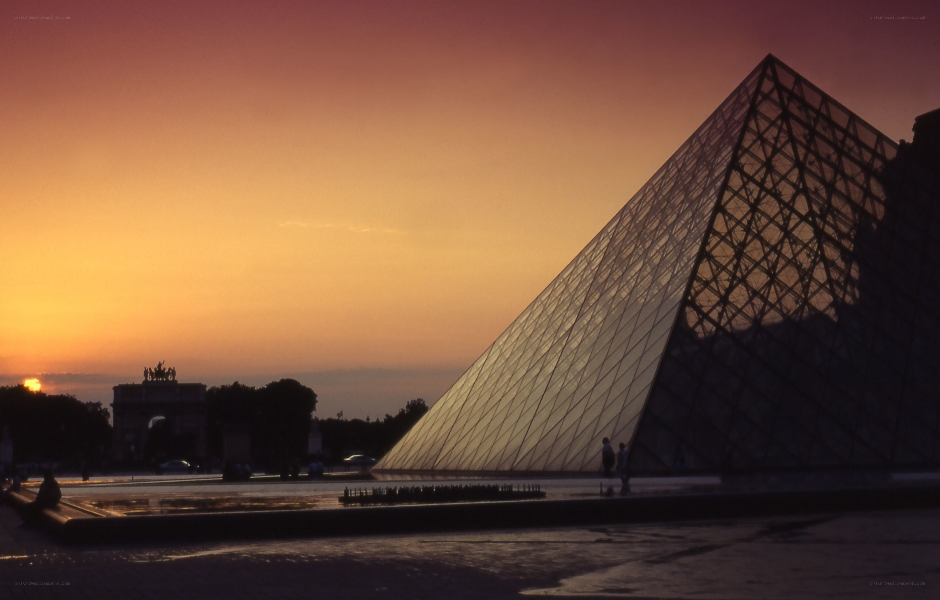 Louvre Pyramid at sunset