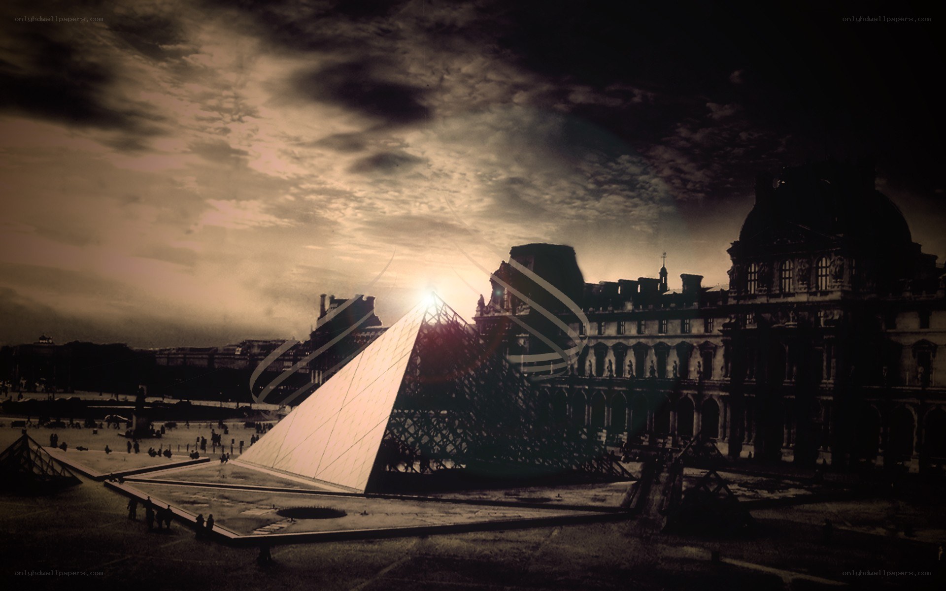 Louvre Pyramid at Sunset