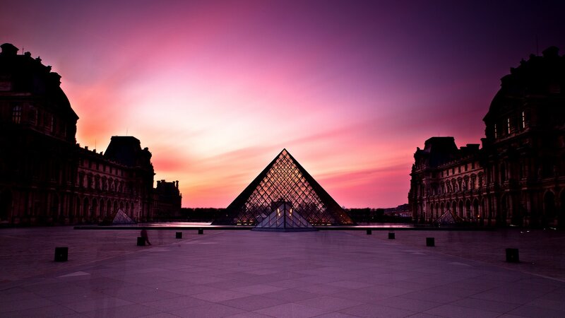 Louvre Pyramid at sunset