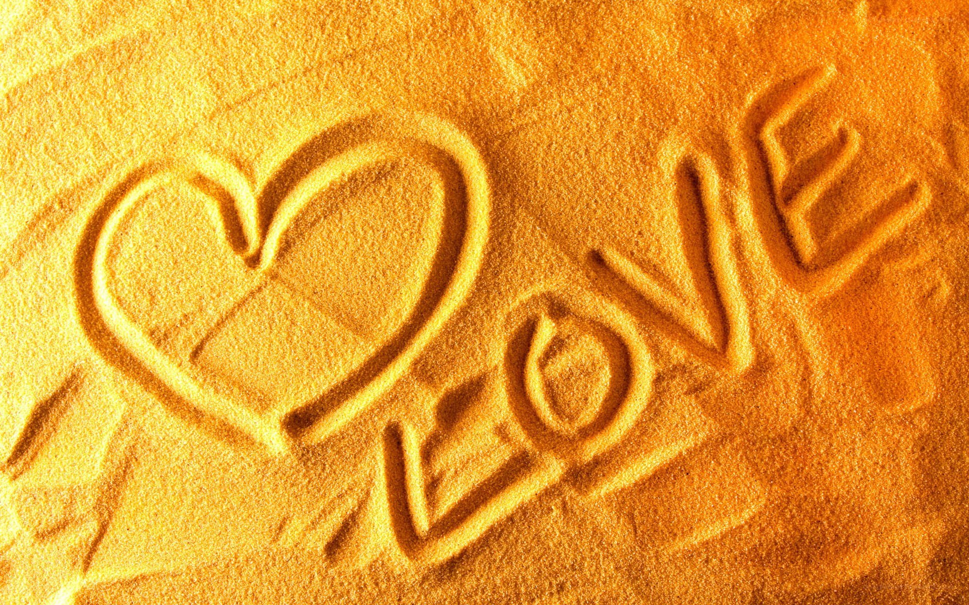 Love carved in sand