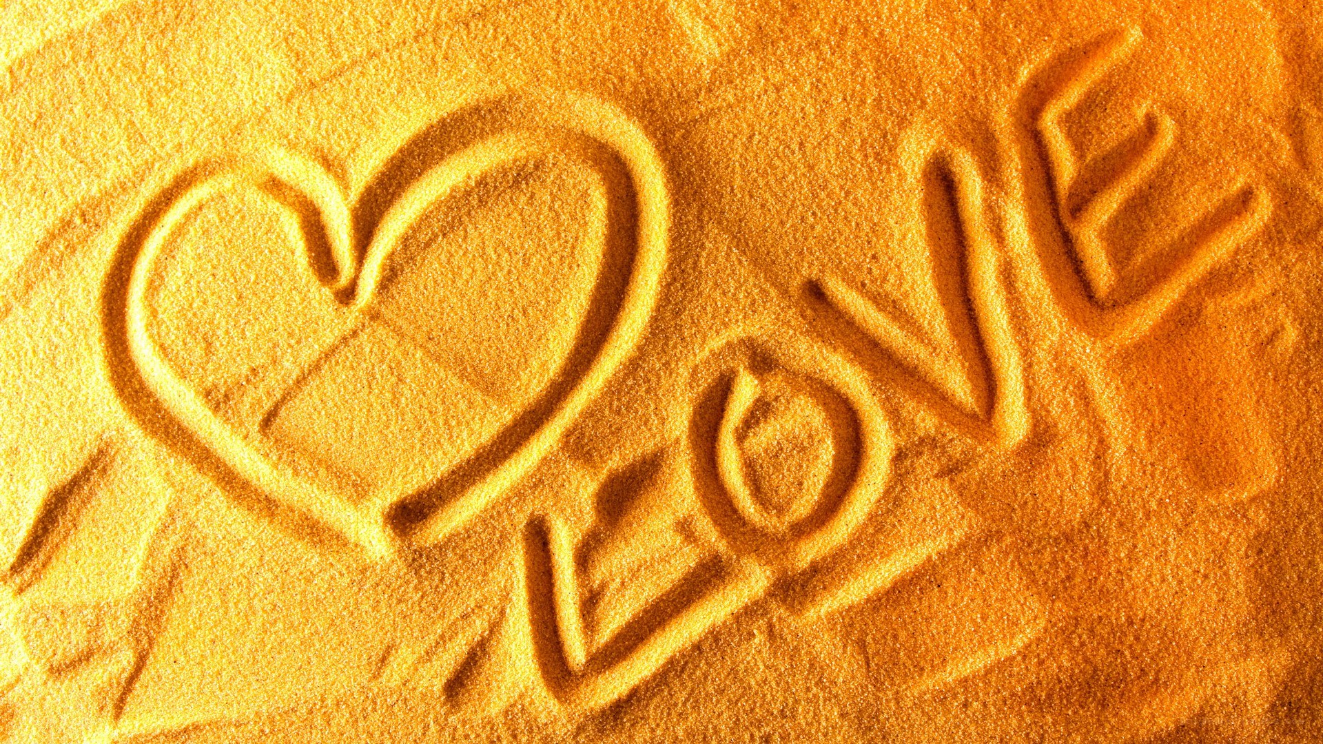 Love carved in sand