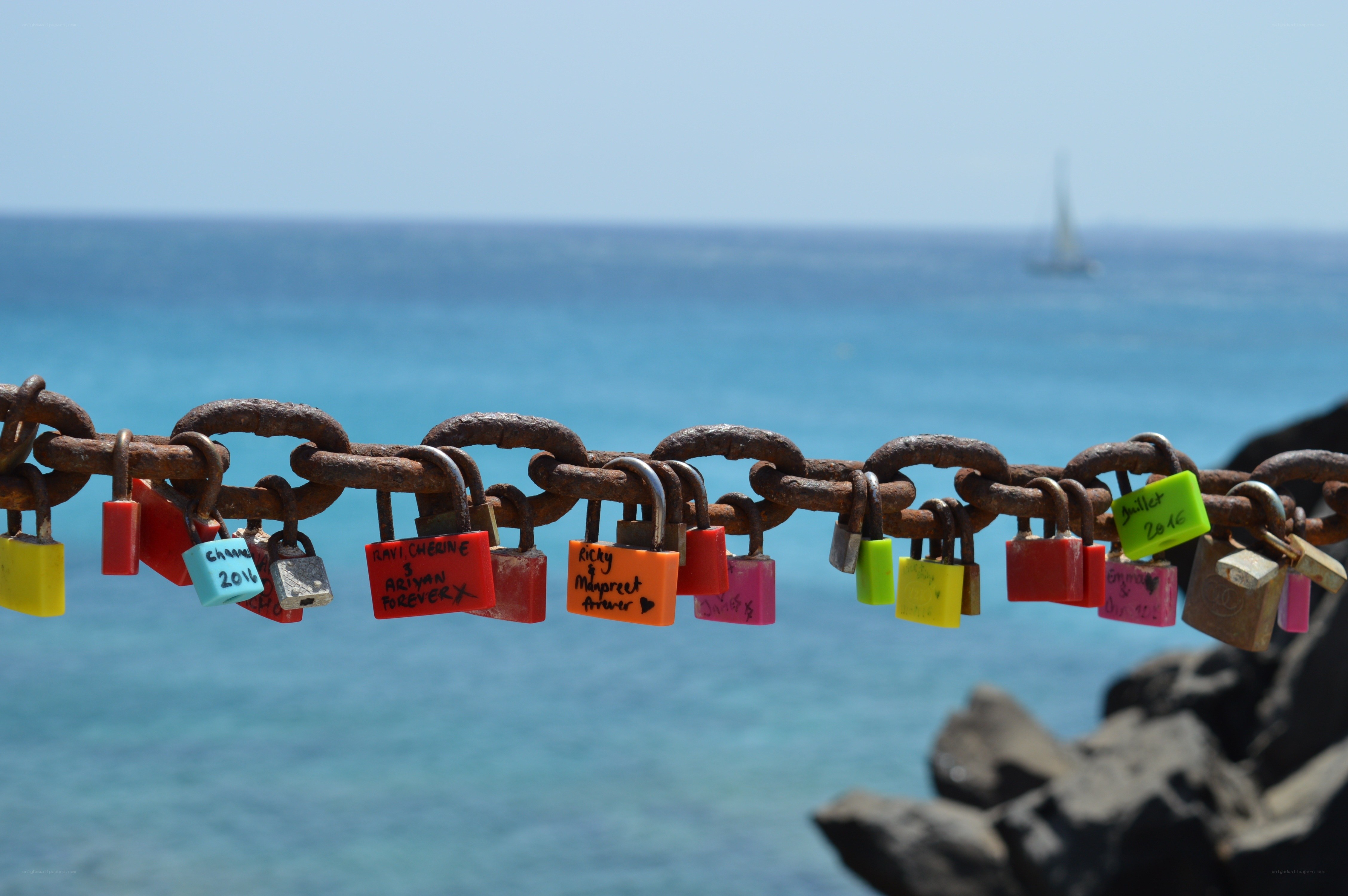 Love locks on a seaside chain