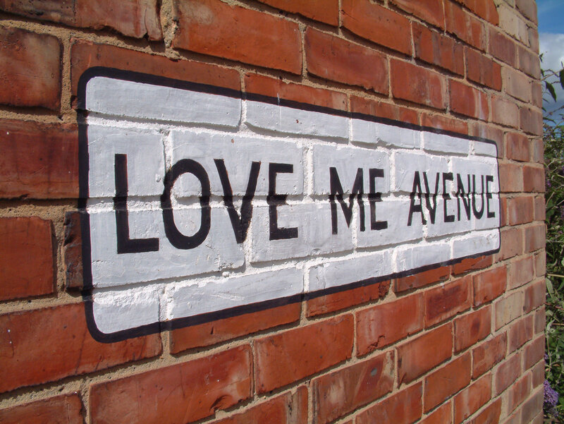 Love Me Avenue street sign