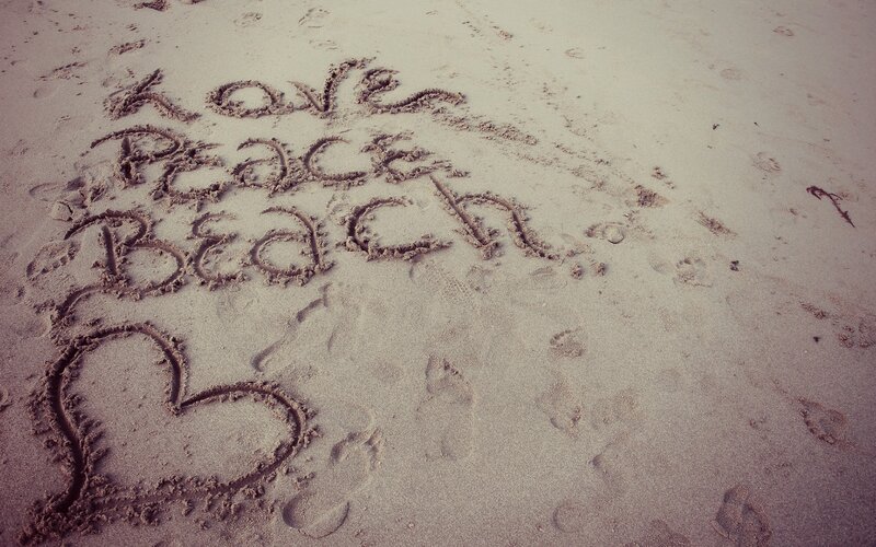 Love Peace Beach message in sand