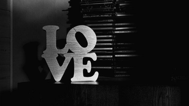 Love sign on a bookshelf