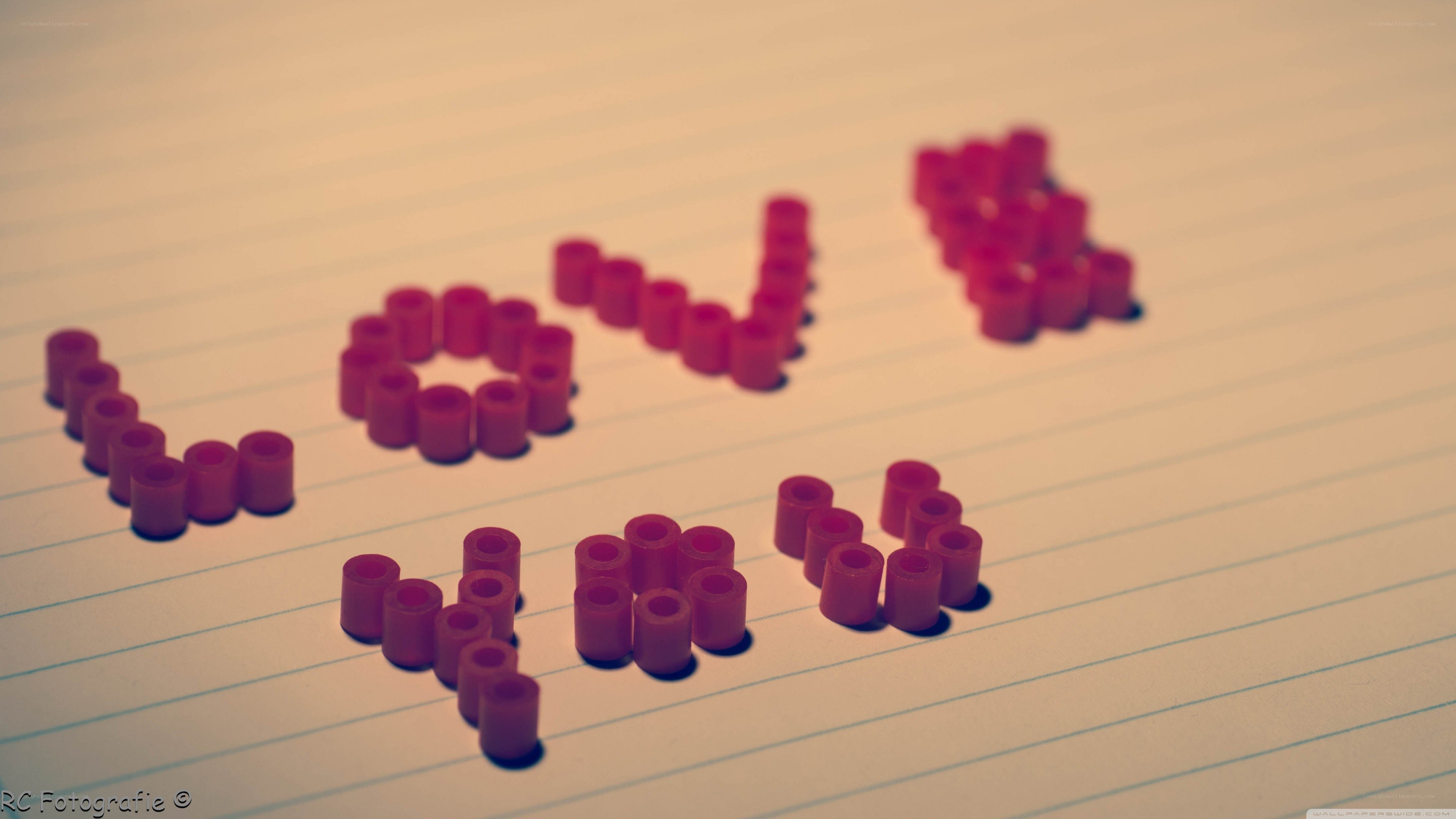 love spelled with beads