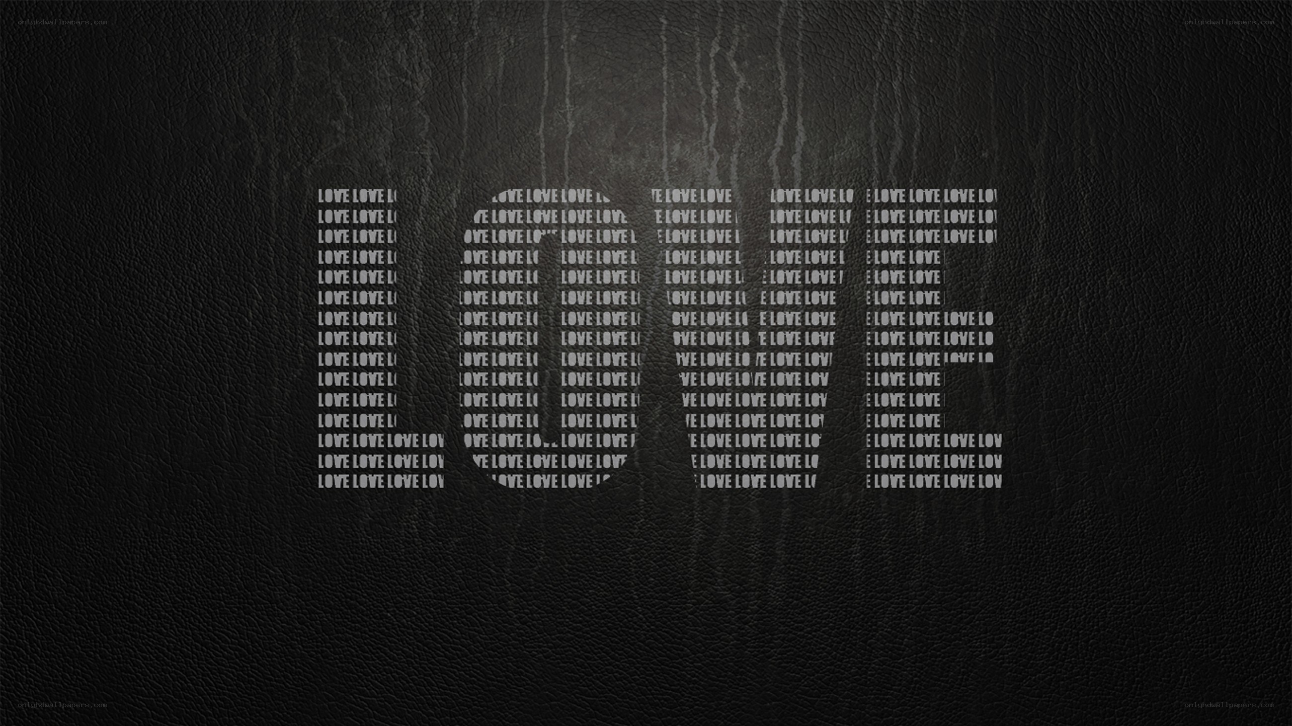 Love text art on black leather