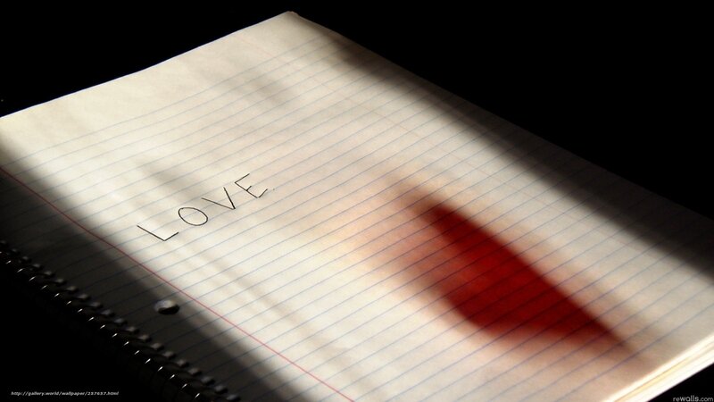 Love written on a notebook with blood stain