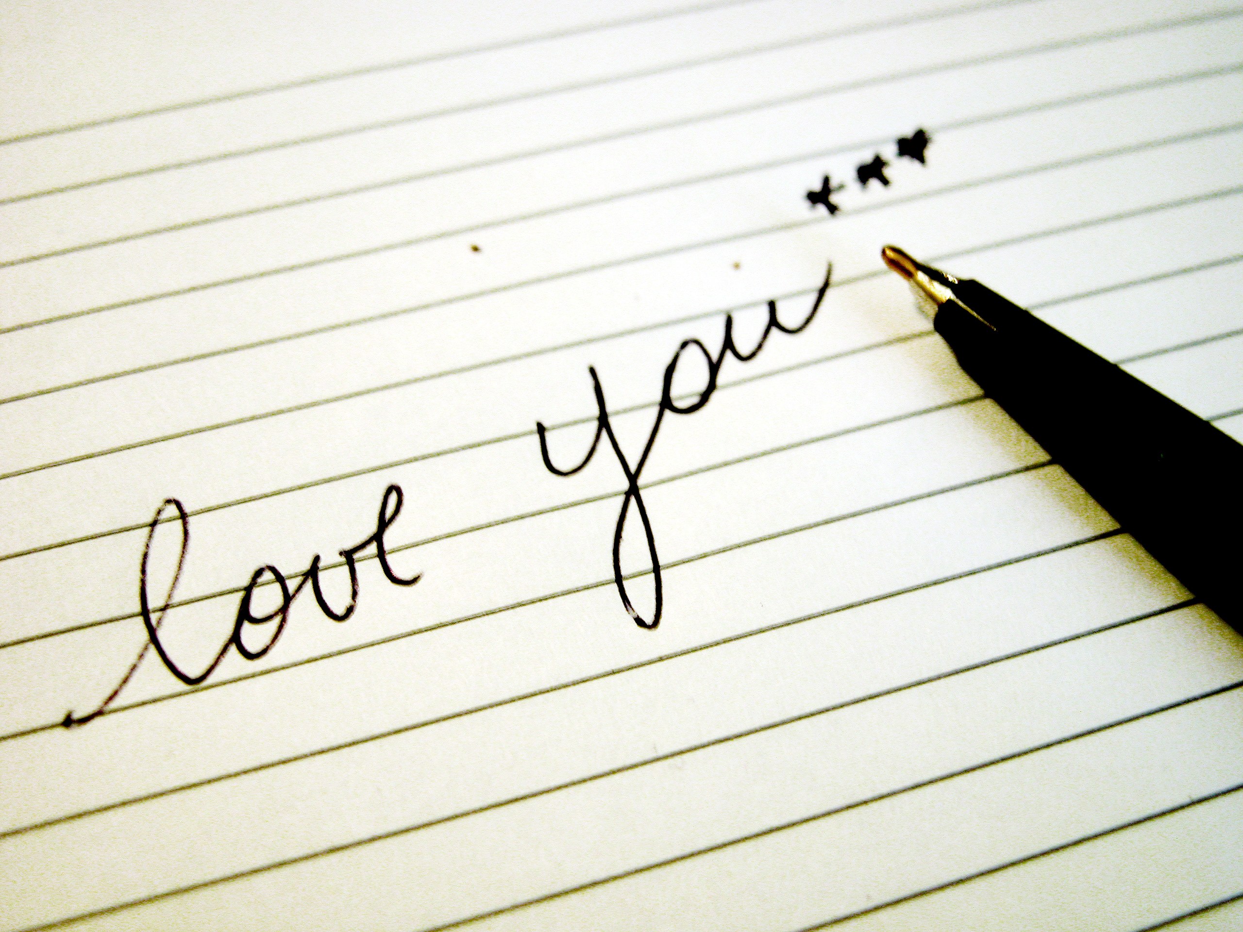 love you written on paper