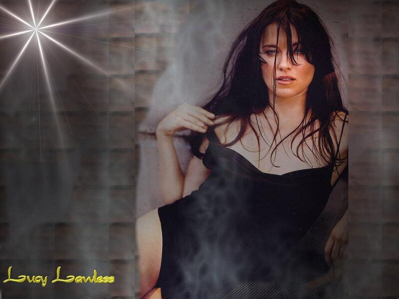 Lucy Lawless in black dress