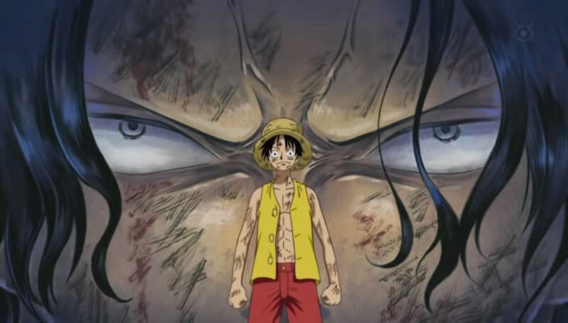Luffy confronts a giant face