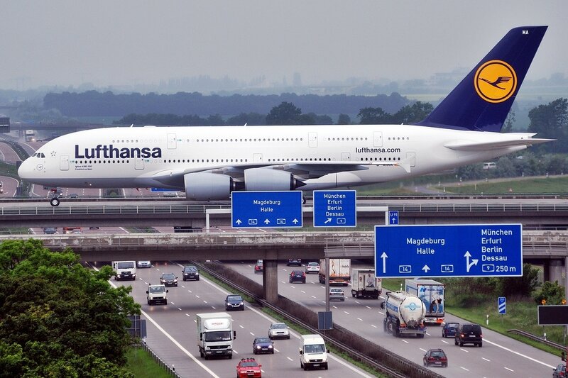 Lufthansa A380 over highway
